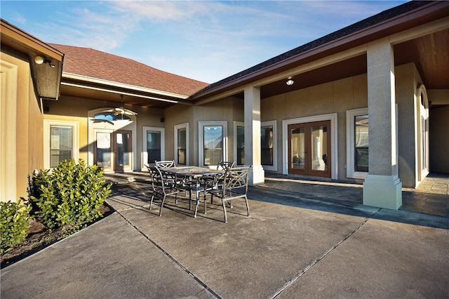 view of patio featuring ceiling fan