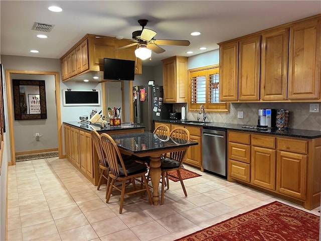 1504 Morningside Dr, Alice, TX 78332 - kitchen featuring dishwasher, a ceiling fan, backsplash, a sink, and recessed lighting