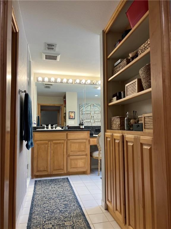 1504 Morningside Dr, Alice, TX 78332 - bathroom with tile patterned flooring and vanity