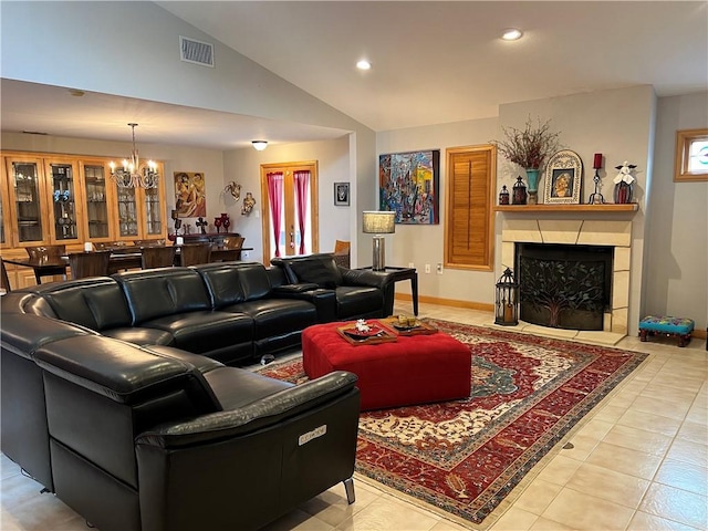 1504 Morningside Dr, Alice, TX 78332 - living room featuring a chandelier, vaulted ceiling, recessed lighting, a fireplace with flush hearth, and light tile patterned floors