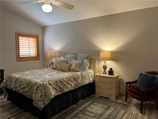 1504 Morningside Dr, Alice, TX 78332 - bedroom with wood finished floors, lofted ceiling, baseboards, and a ceiling fan