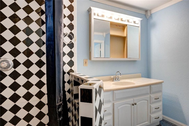 bathroom featuring vanity, walk in shower, and crown molding