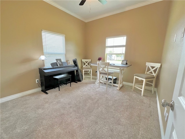 misc room with crown molding, ceiling fan, and light colored carpet