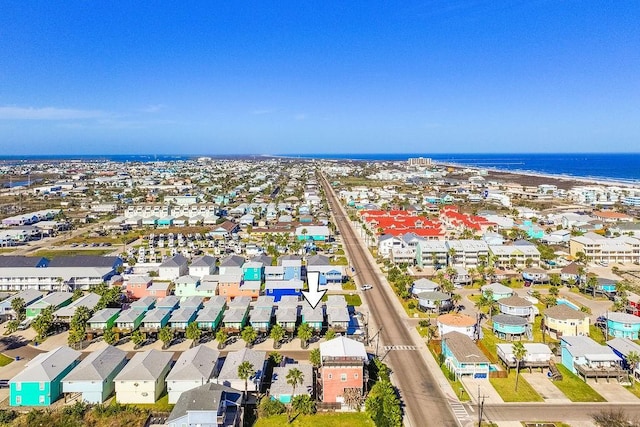 drone / aerial view featuring a water view and a residential view