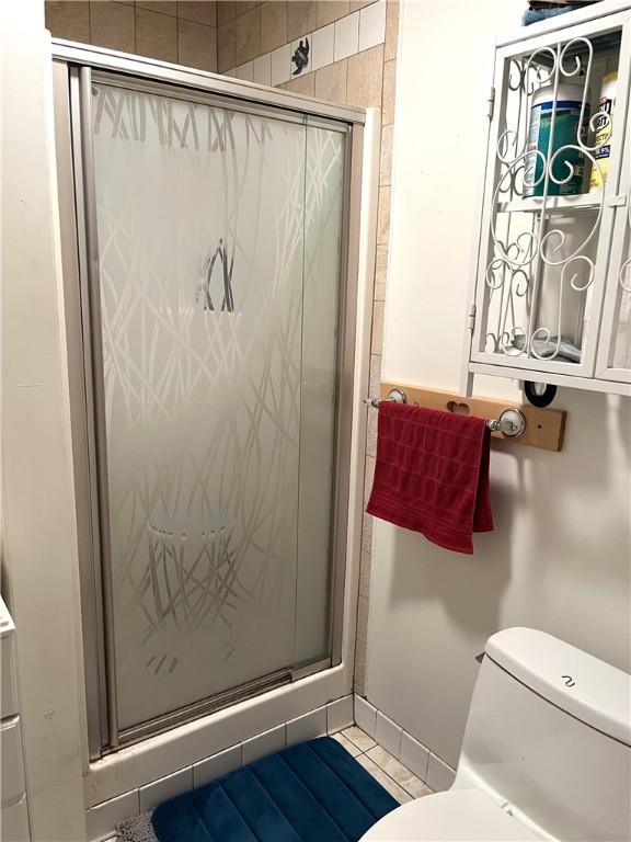 216 Steart St, Rockport, TX 78382 - bathroom with toilet and walk in shower