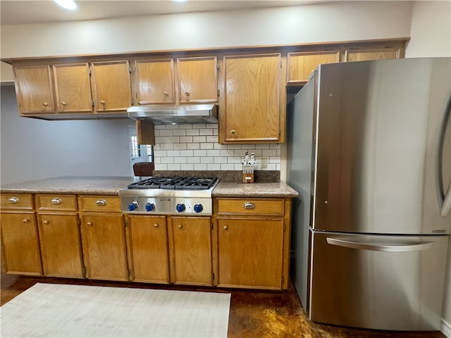 kitchen with decorative backsplash and stainless steel appliances