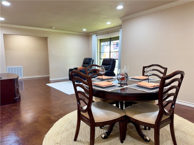 dining area with crown molding