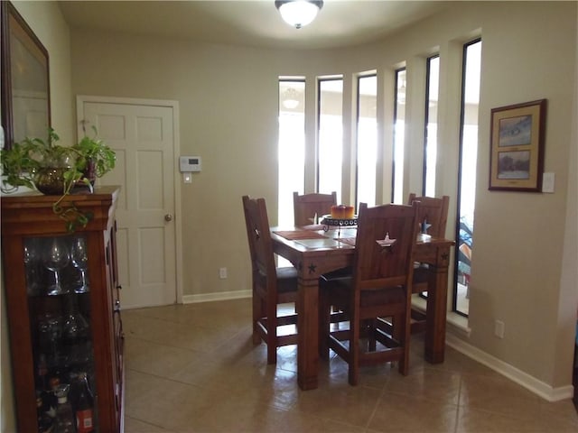 425 Seco Dr, Portland, TX 78374 - dining area featuring baseboards and light tile patterned floors