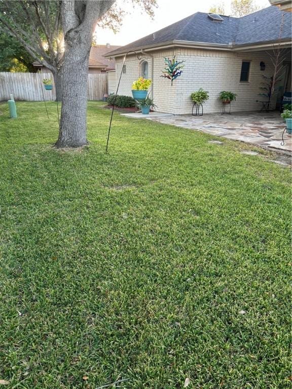 425 Seco Dr, Portland, TX 78374 - view of yard featuring a patio