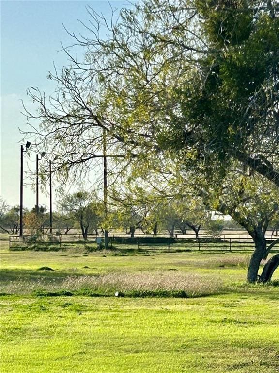 view of home's community with a yard