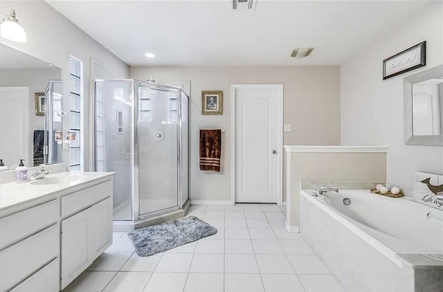 14877 Cobo De Bara, Corpus Christi, TX 78418 - full bath featuring a stall shower, vanity, a garden tub, tile patterned flooring, and recessed lighting