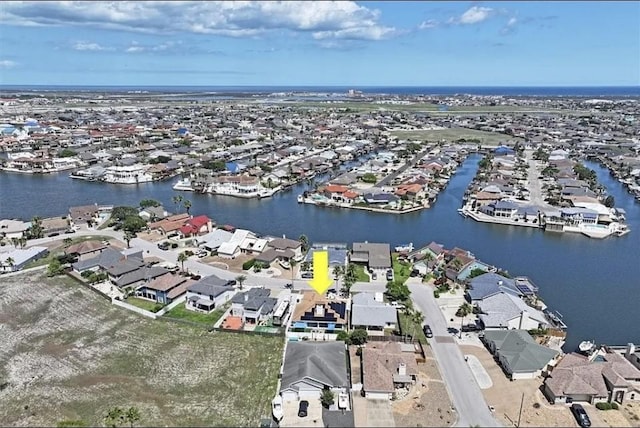 14877 Cobo De Bara, Corpus Christi, TX 78418 - aerial view of property and surrounding area with nearby suburban area and a nearby body of water