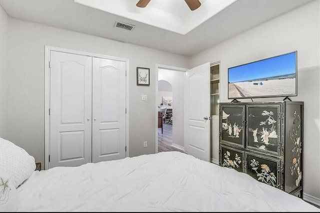 14877 Cobo De Bara, Corpus Christi, TX 78418 - bedroom featuring arched walkways, a ceiling fan, and a closet
