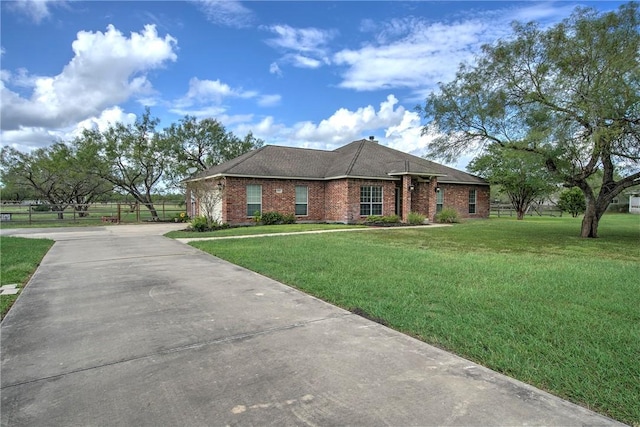 5617 Grand Lake Cir, Robstown, TX 78380 - ranch-style home featuring concrete driveway and brick siding