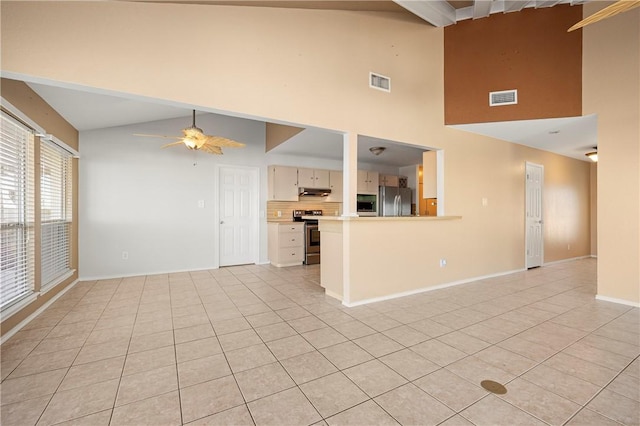 unfurnished living room with lofted ceiling with beams, light tile patterned flooring, visible vents, and ceiling fan