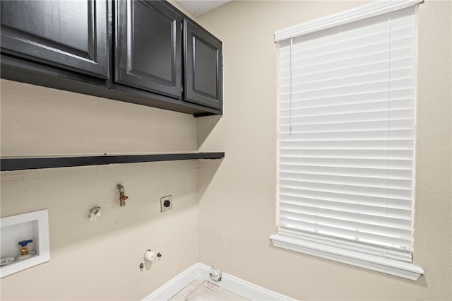 laundry room featuring hookup for a washing machine, baseboards, hookup for an electric dryer, and gas dryer hookup