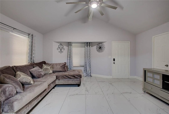 living room with ceiling fan and lofted ceiling