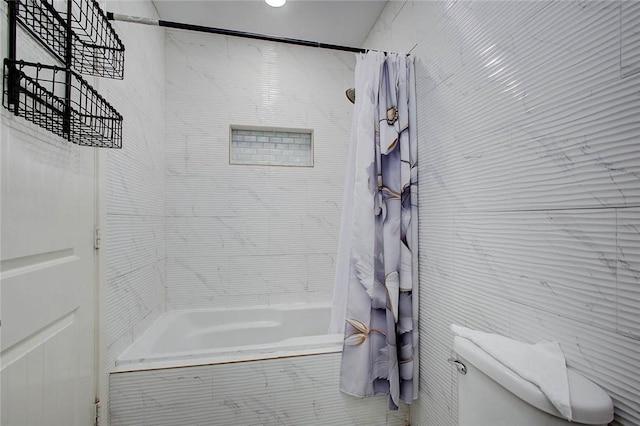 bathroom with toilet and shower / tub combo with curtain