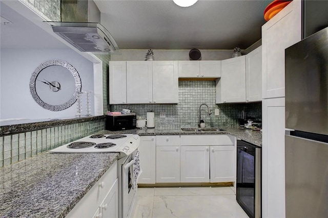 kitchen with white range with electric stovetop, stainless steel refrigerator, sink, and white cabinets