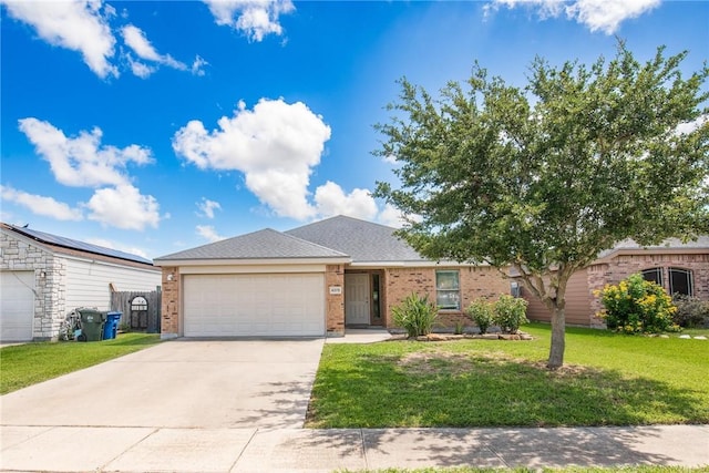 4376 Summer Wind Dr, Corpus Christi, TX 78413 - single story home featuring a garage, driveway, brick siding, and a front lawn