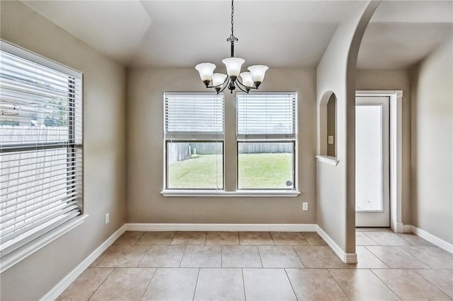 4376 Summer Wind Dr, Corpus Christi, TX 78413 - unfurnished dining area with healthy amount of natural light, a chandelier, and light tile patterned flooring