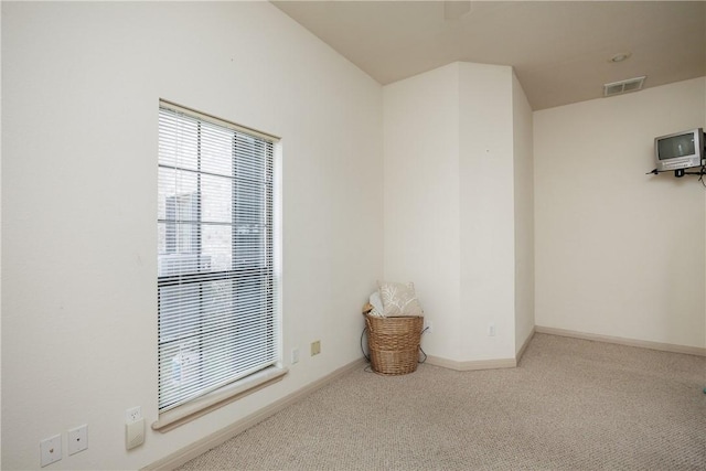 view of carpeted spare room