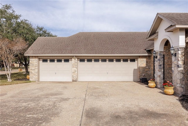 exterior space featuring concrete driveway