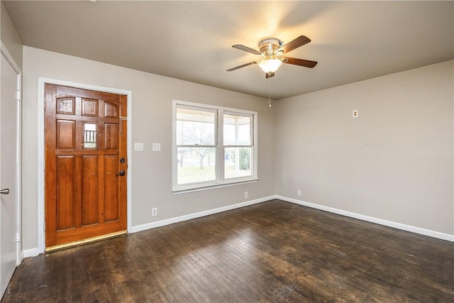 entryway with ceiling fan, baseboards, and dark wood finished floors