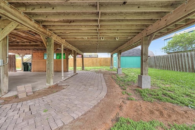 view of patio with an outdoor structure