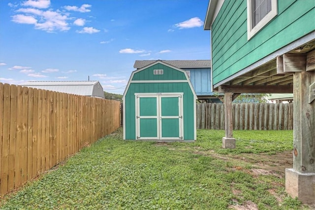 view of shed with a fenced backyard