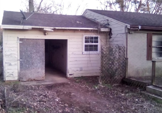 view of home's exterior featuring a shingled roof