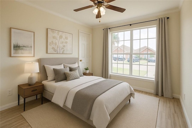 6333 Penny Ln, Corpus Christi, TX 78414 - bedroom with light wood-type flooring, crown molding, and a ceiling fan