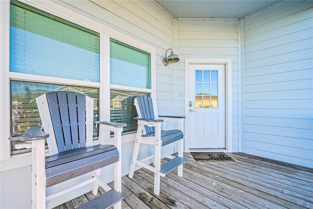 doorway to property with a wooden deck