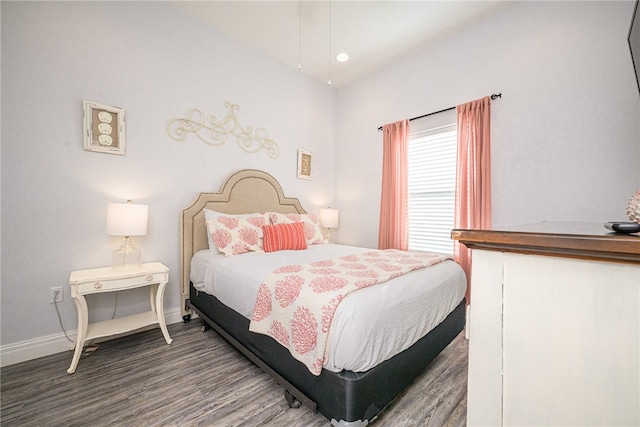 bedroom featuring hardwood / wood-style flooring