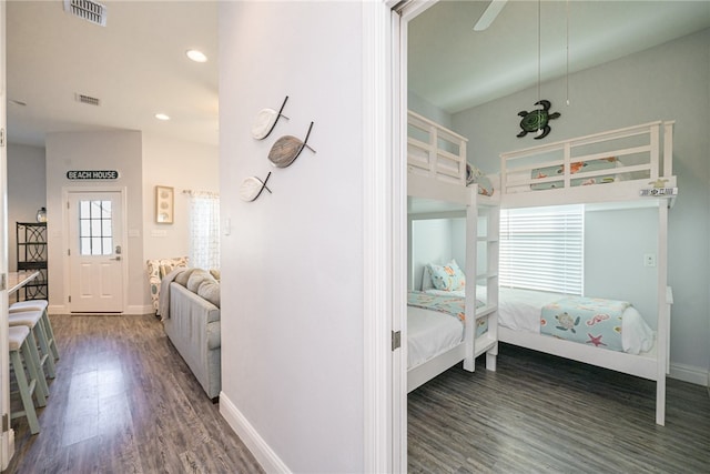 bedroom featuring dark hardwood / wood-style flooring and ceiling fan