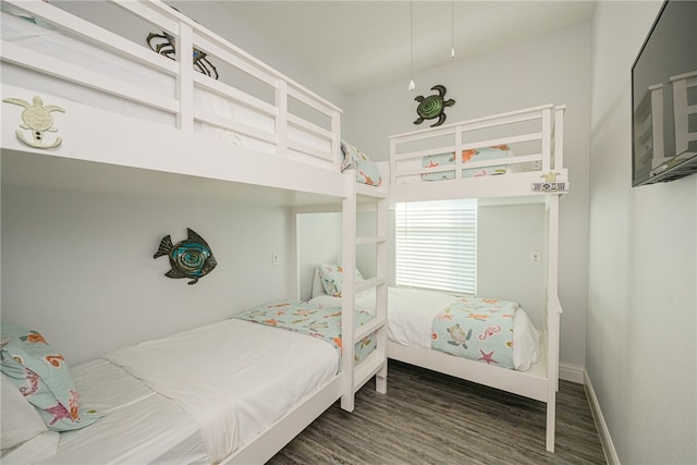 bedroom featuring dark hardwood / wood-style flooring