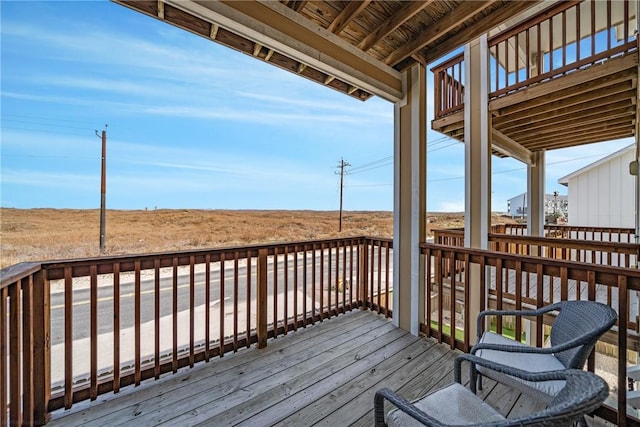 deck featuring a rural view