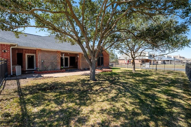4302 Pontchartrain Dr, Corpus Christi, TX 78413 - fenced backyard with a patio