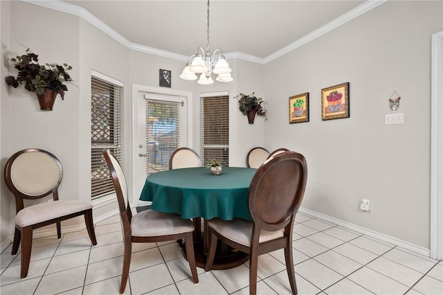 dining area with light tile patterned floors, baseboards, a notable chandelier, and crown molding