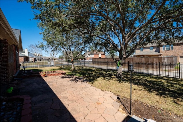 view of patio featuring fence