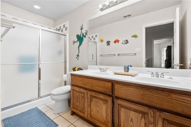 full bath featuring toilet, a sink, visible vents, and tile patterned floors