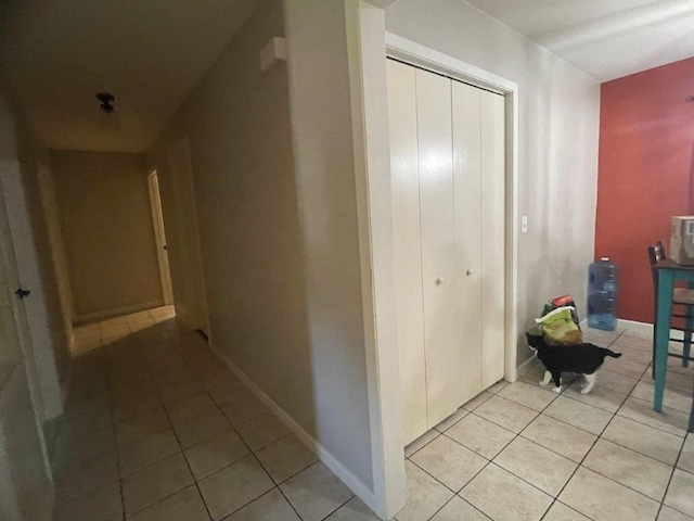 hallway with light tile patterned flooring