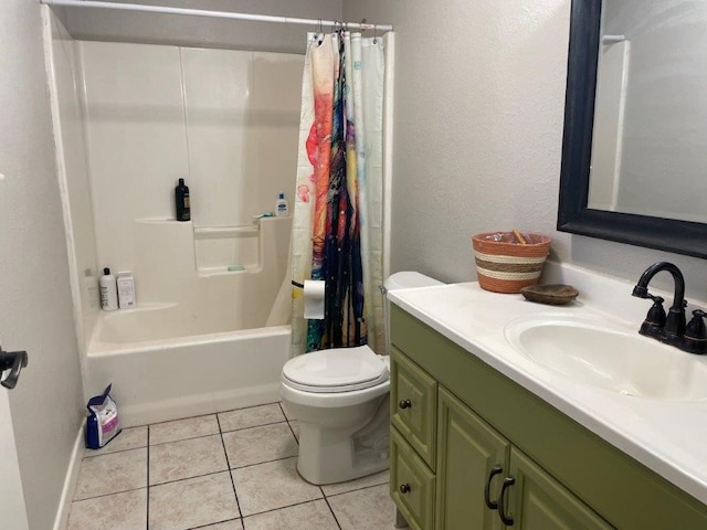 full bathroom with toilet, vanity, tile patterned floors, and shower / tub combo