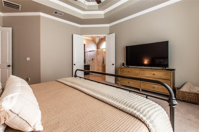 bedroom with ornamental molding, ceiling fan, and carpet