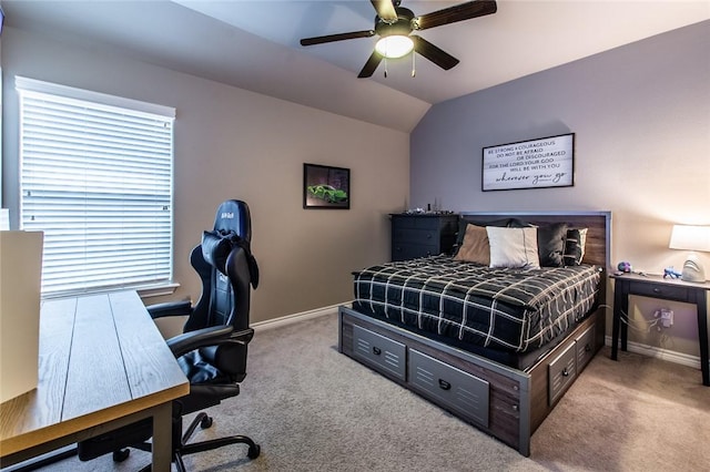 bedroom featuring light carpet, vaulted ceiling, and ceiling fan