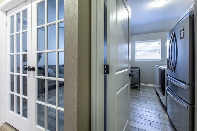 interior space featuring french doors and washer and dryer