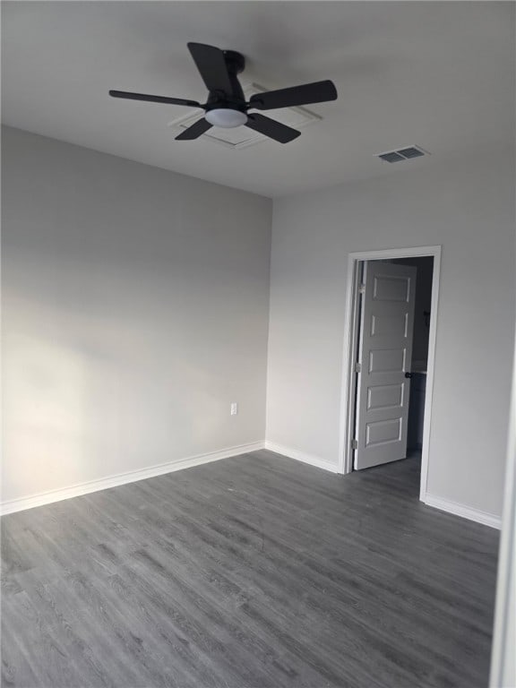 714 Mereet Dr, Corpus Christi, TX 78418 - empty room with ceiling fan, visible vents, dark wood-style floors, and baseboards