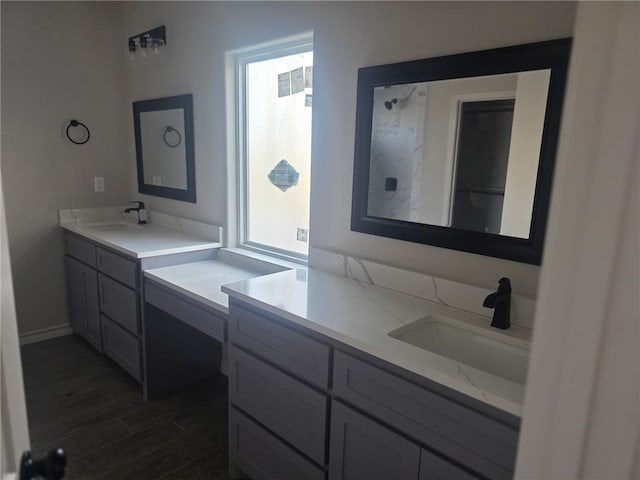 714 Mereet Dr, Corpus Christi, TX 78418 - full bathroom with plenty of natural light, a sink, and wood finished floors