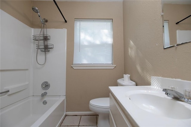 1005 Ronald Dr, Corpus Christi, TX 78412 - bathroom with bathtub / shower combination, toilet, vanity, tile patterned floors, and baseboards