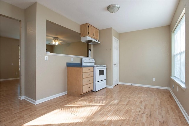 1005 Ronald Dr, Corpus Christi, TX 78412 - kitchen featuring electric stove, light wood-style floors, ceiling fan, and plenty of natural light